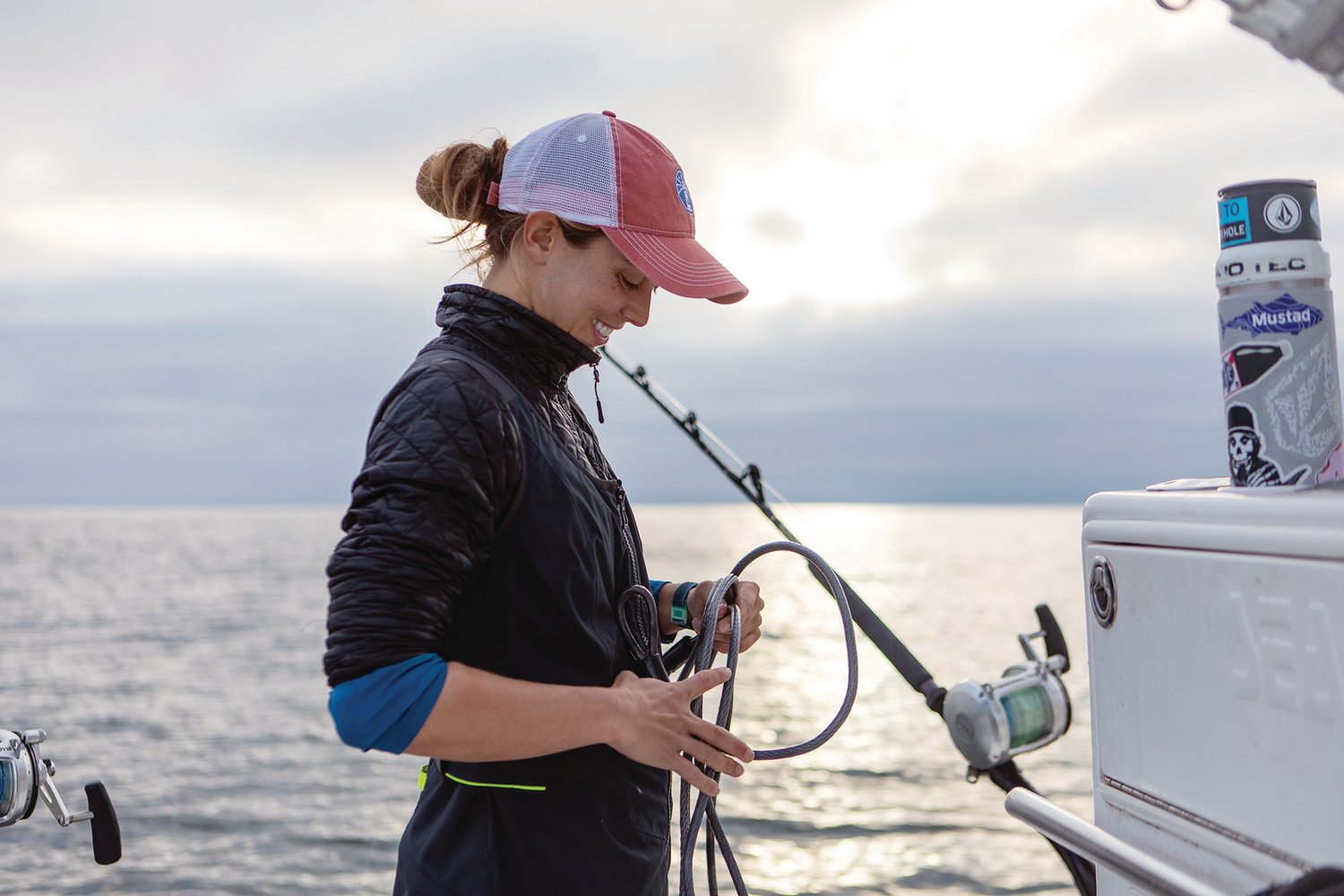 RESETTING GEAR: De Silva resets gear after safely and humanely catching and satellite tagging a 9-foot porbeagle shark 25 miles off Cape Cod.
